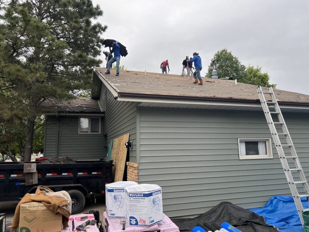 Full residential roof tear-off and replacement in progress
