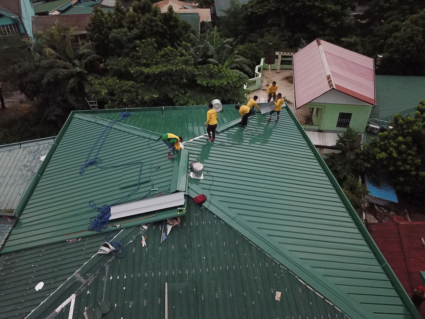 Summit Roof & Restoration crew working on a Dallas Fort Worth home
